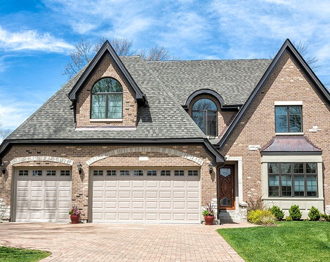 home with asphalt roofing in euclid