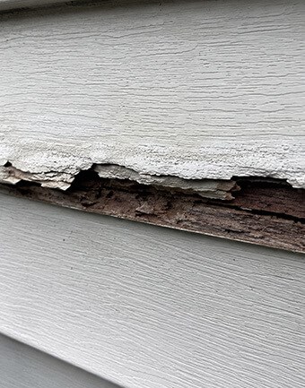 inspecting siding surface damage