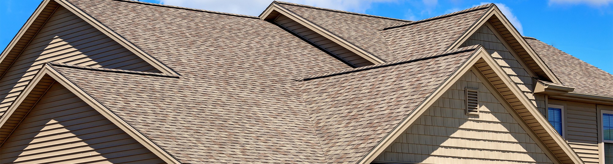home in Euclid with asphalt roofing installed by our roofers