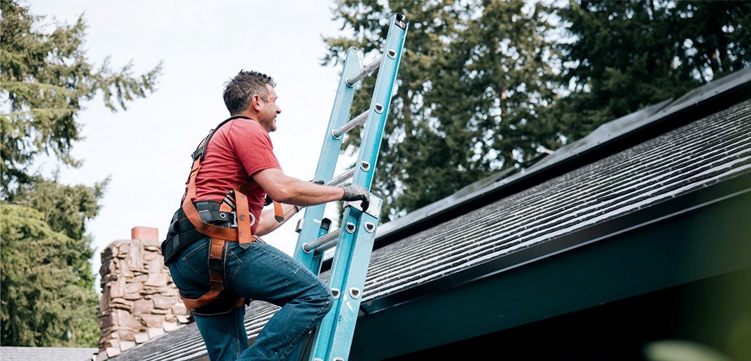 our roofer in euclid completing a roof inspection